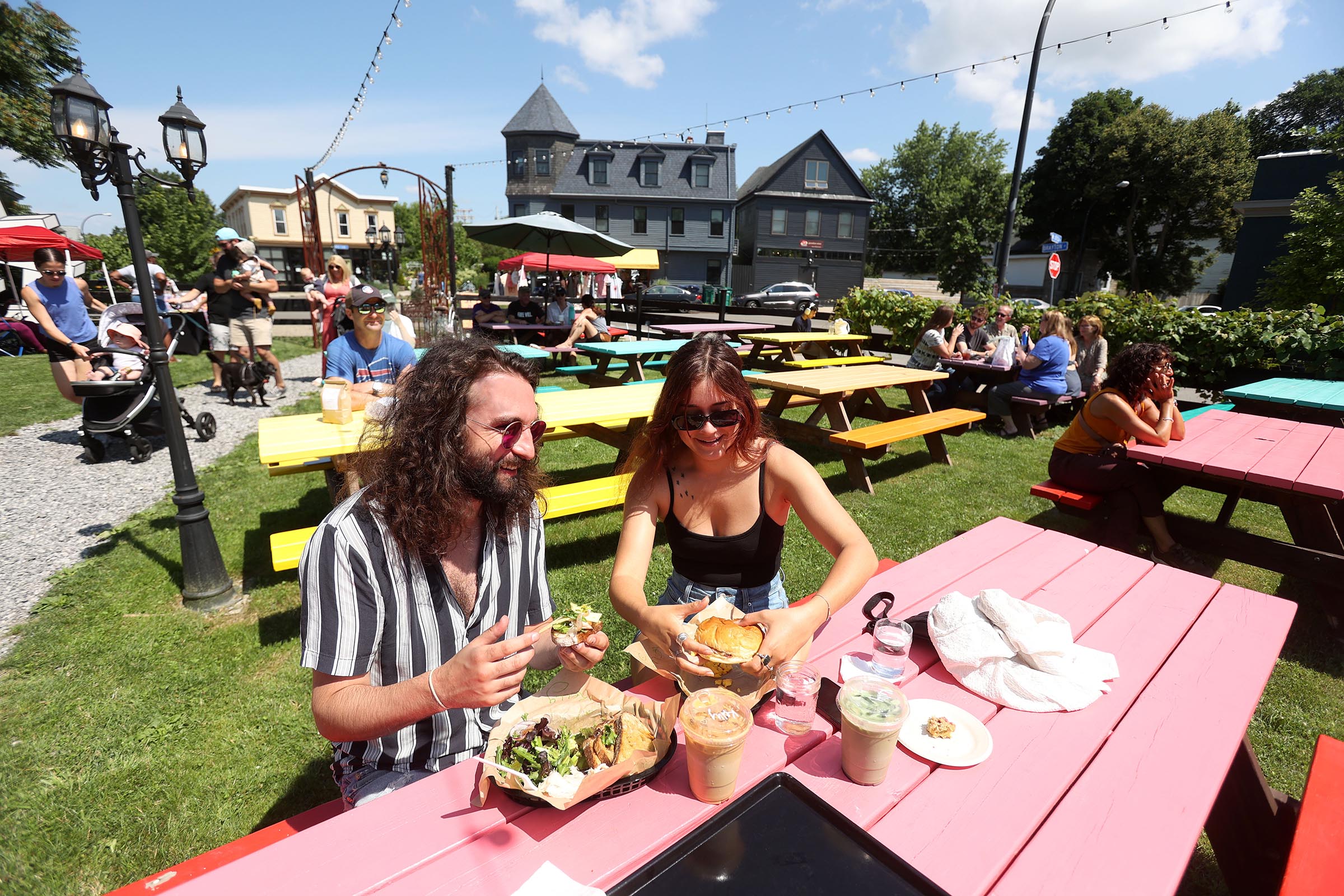 People enjoy lunch and music of the Buffalo Jazz Collective at Five Points in Buffalo Saturday, July 8, 2023. (Photo by Mark Mulville)
